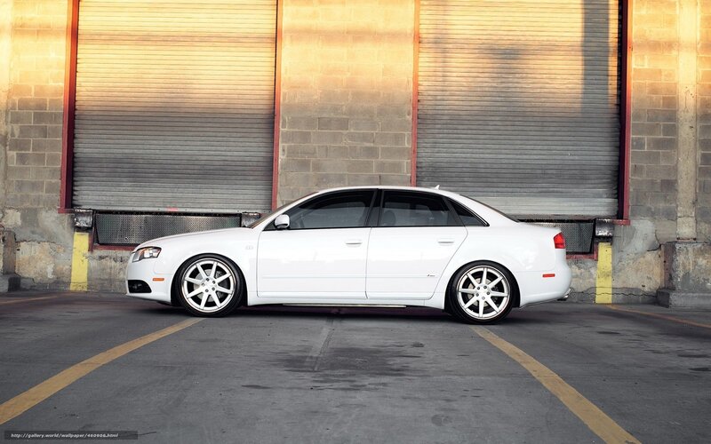 white audi sedan in garage