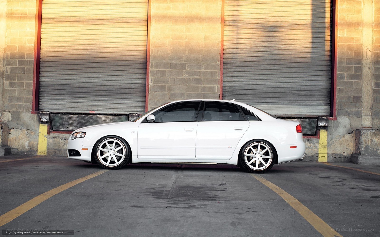 white audi sedan in garage