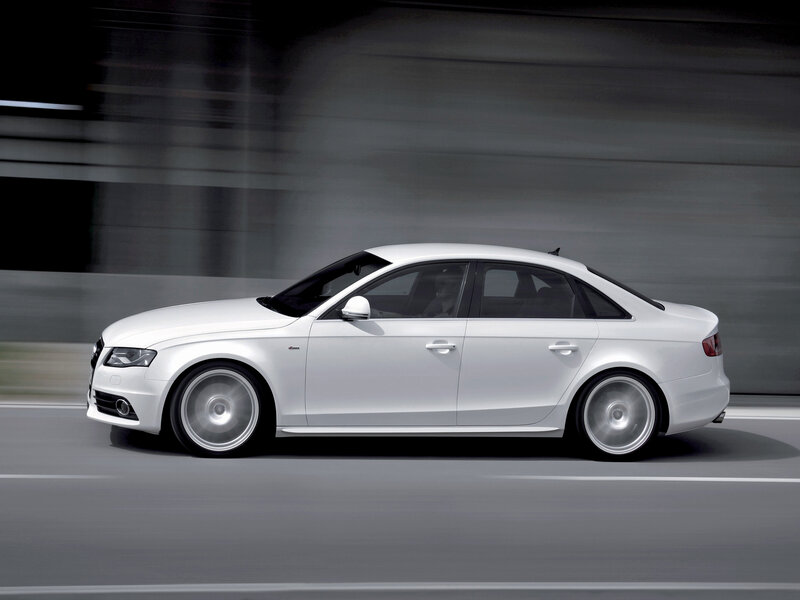 white audi sedan in motion
