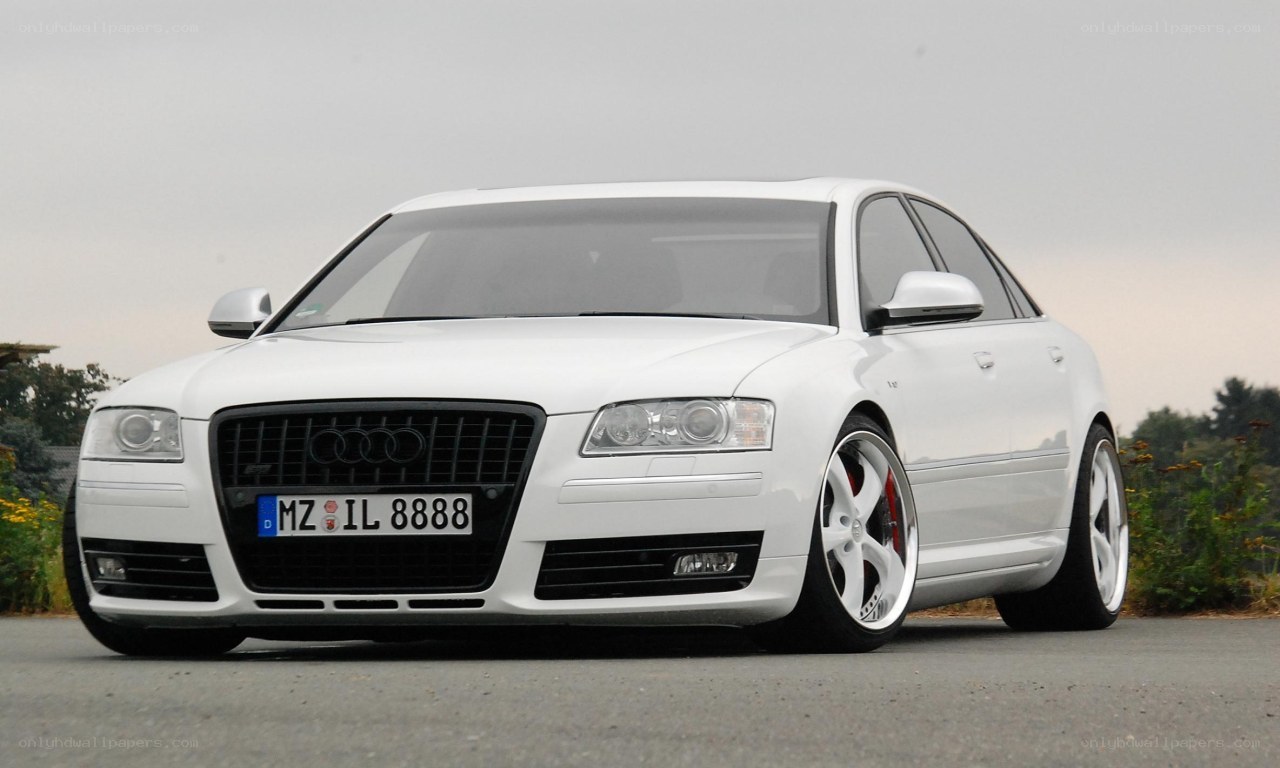 white audi sedan on road