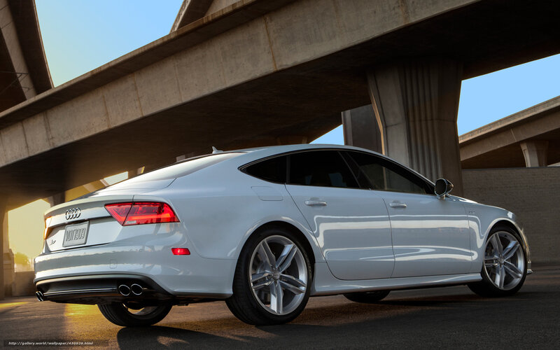 White Audi sedan under overpass