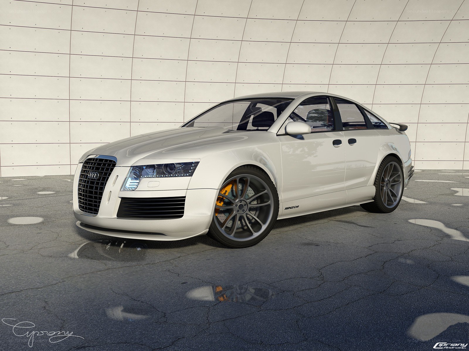 White Audi sedan with custom wheels