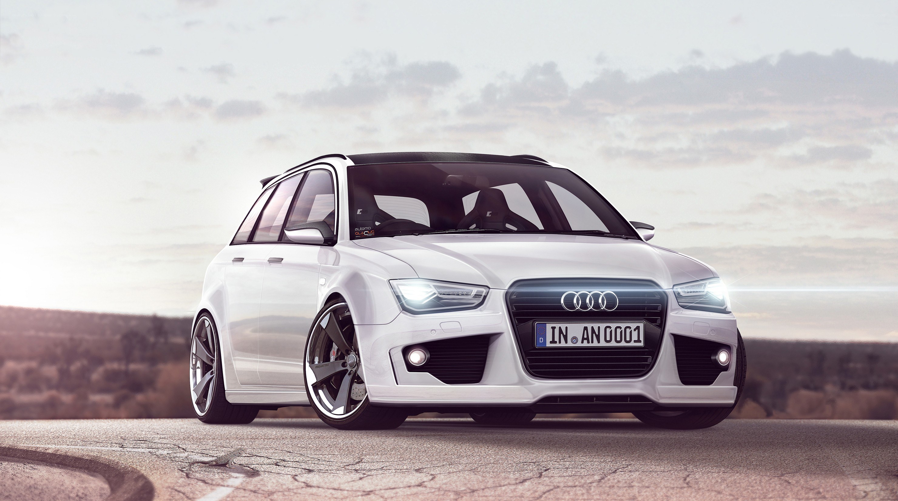 White Audi station wagon