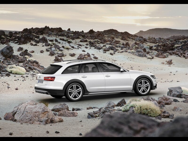 White Audi station wagon in desert