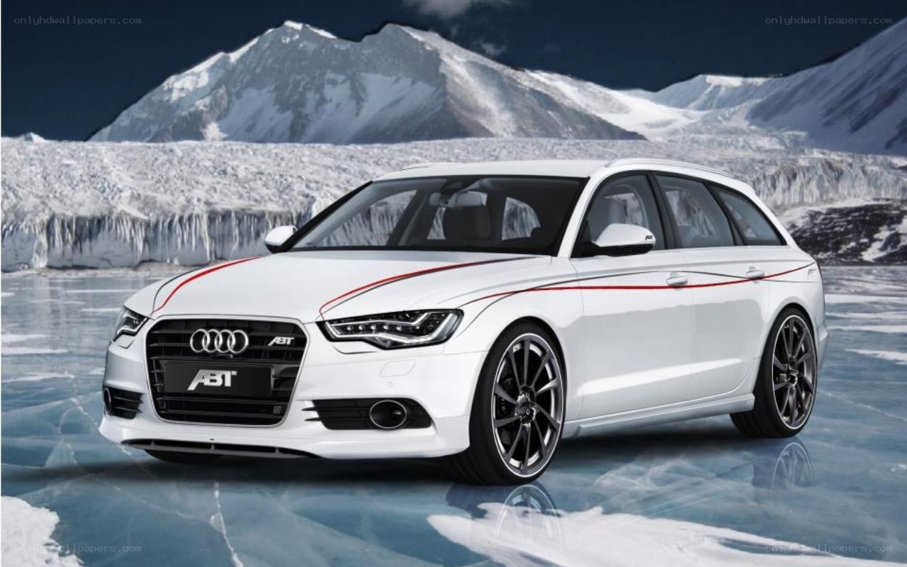 White Audi station wagon on ice