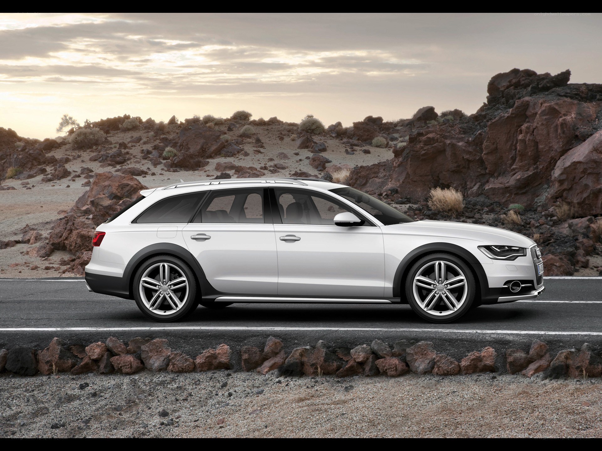 White Audi station wagon on road