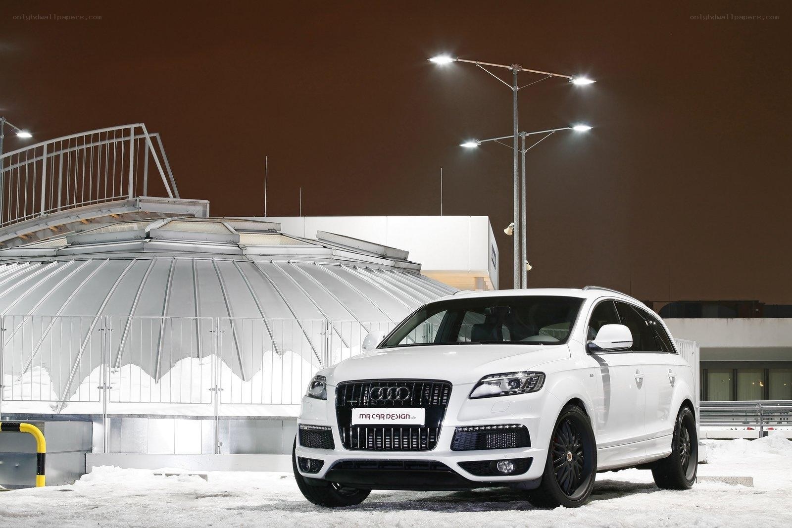 White Audi SUV in snow