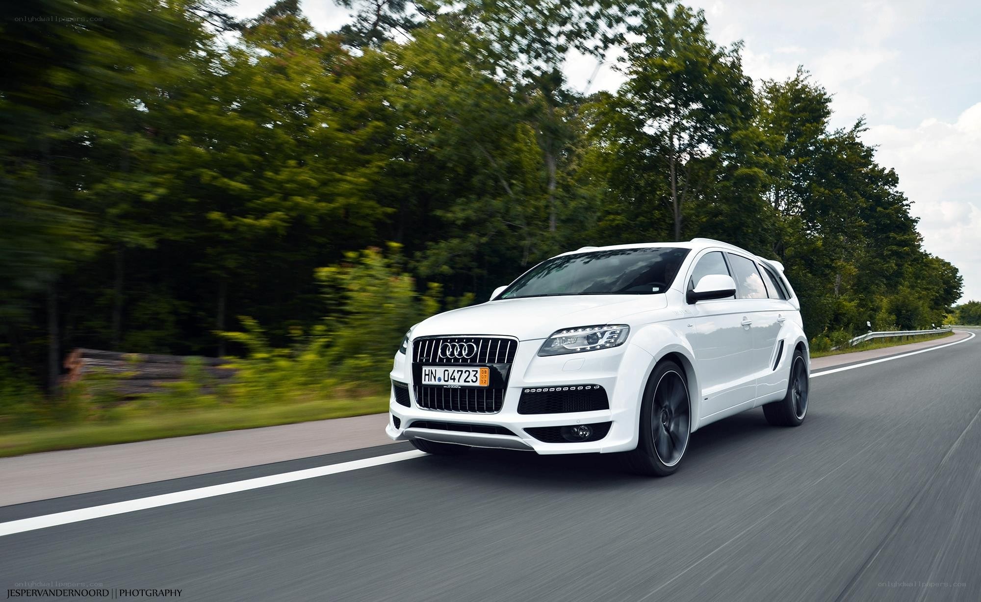 white audi suv on road