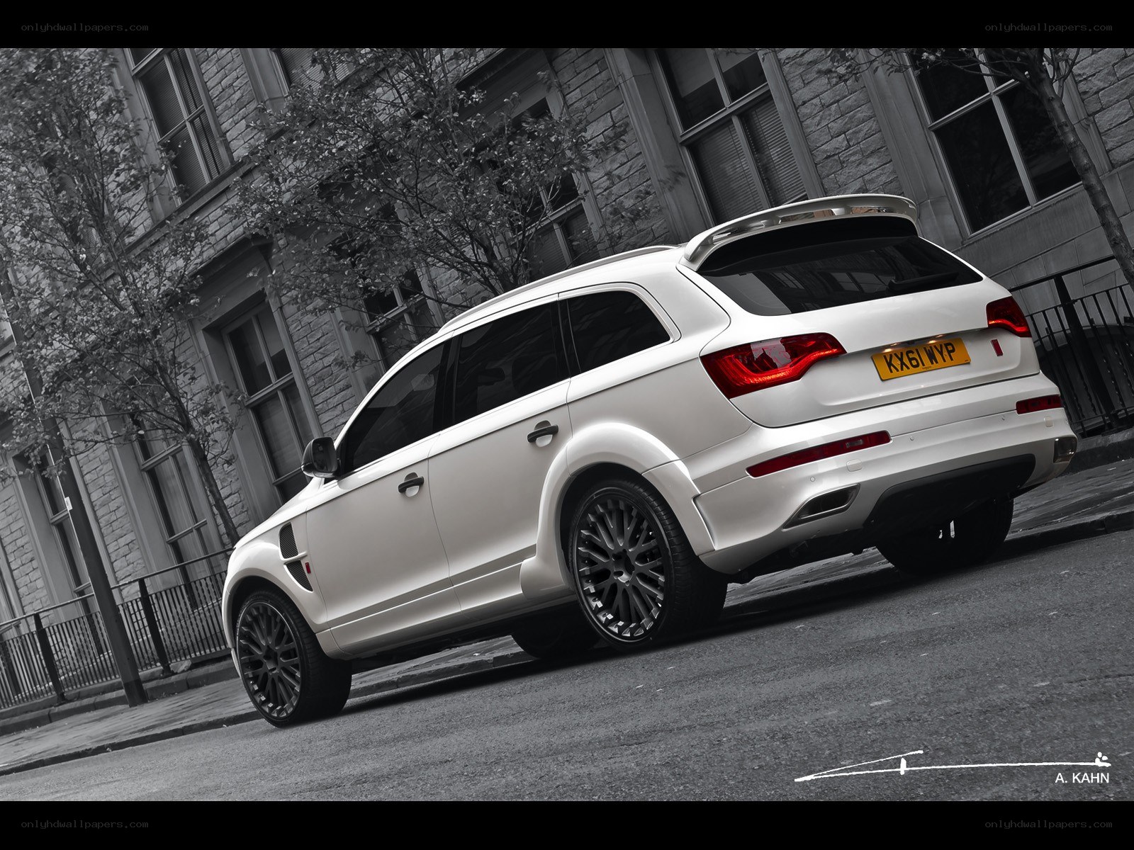 white audi suv on street
