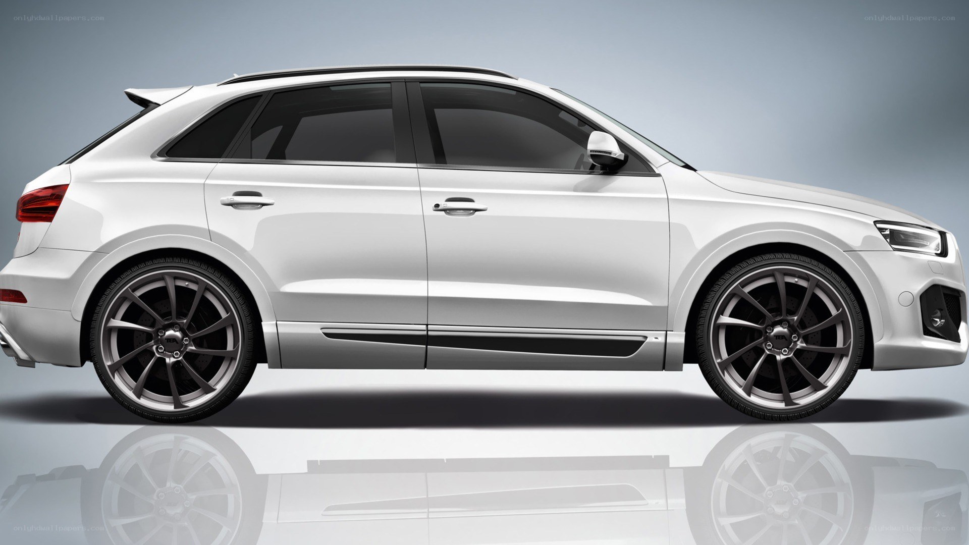 white audi suv side view