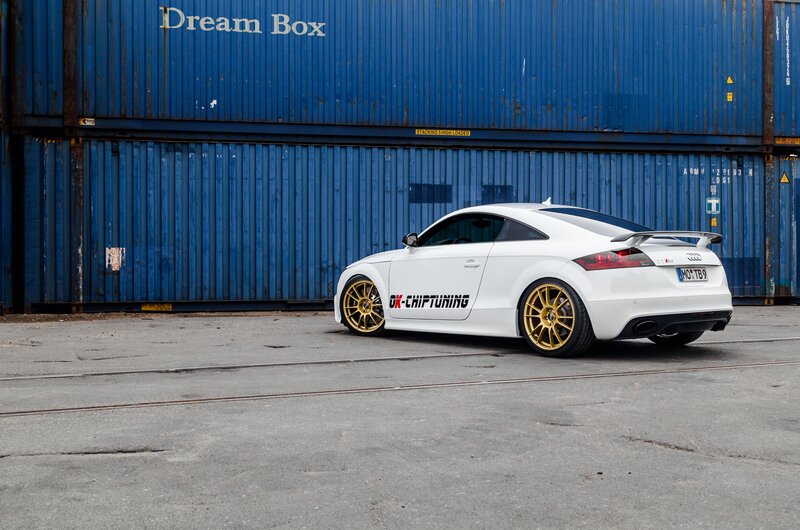 White Audi Tt Car — Industrial, Photograph, Blue Shipping Containers