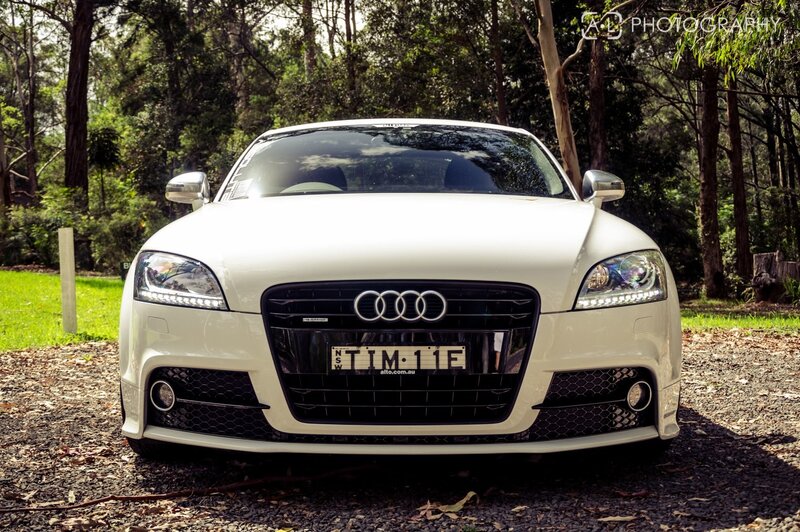 White Audi TT in forest