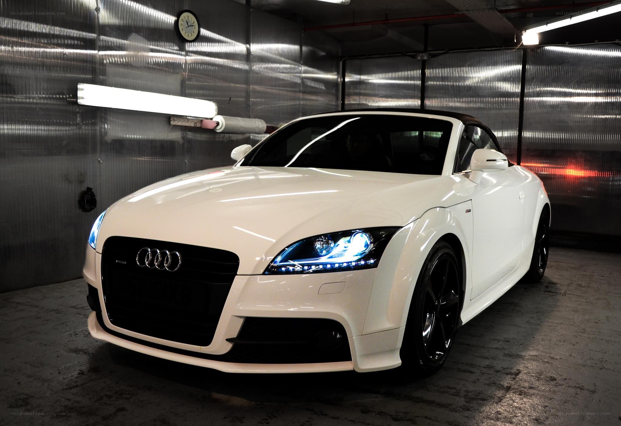 White Audi TT in garage