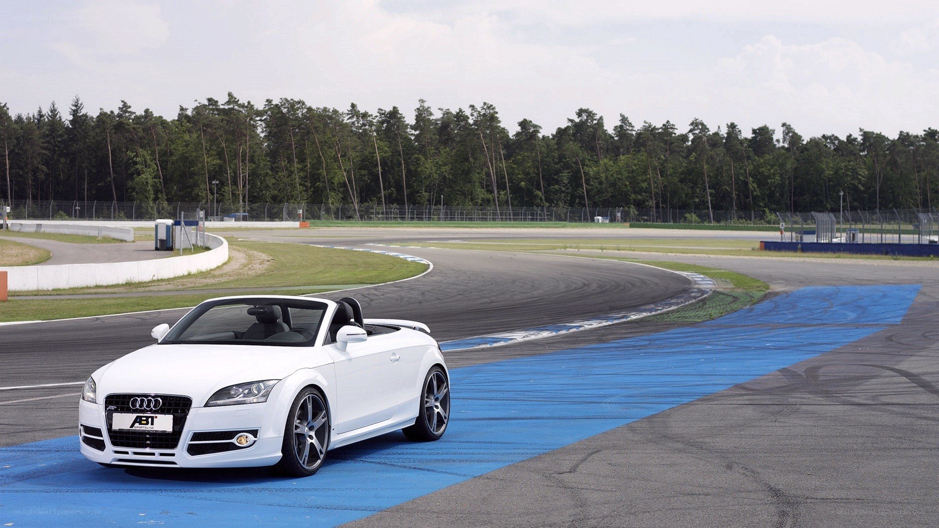 White Audi TT on a racetrack