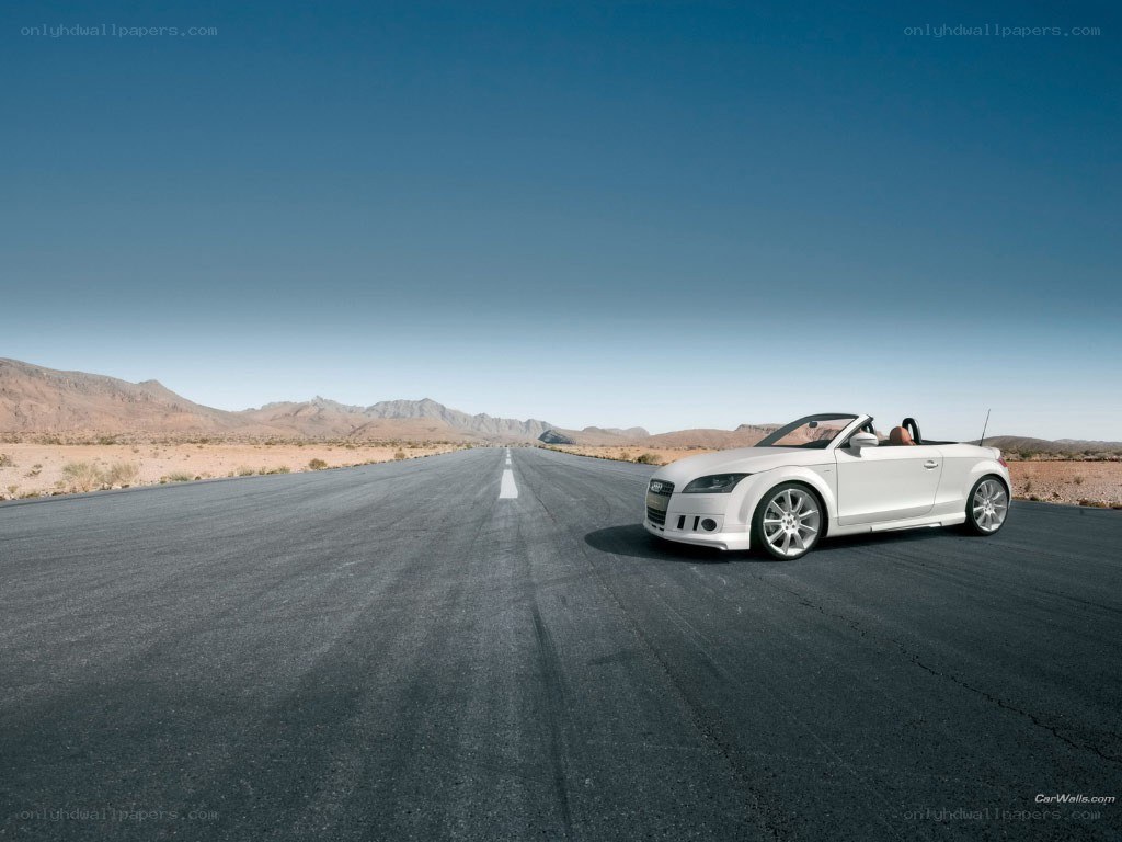 White Audi TT on desert road