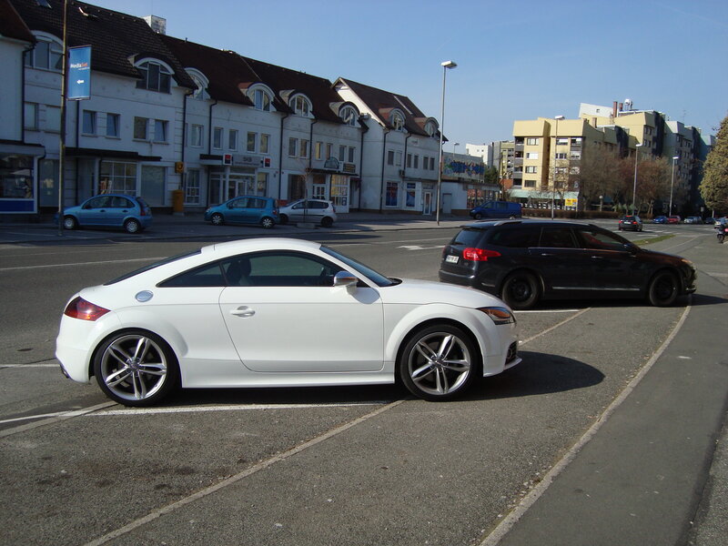 White Audi TT parked in city