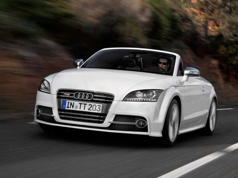 White Audi TT Roadster in motion