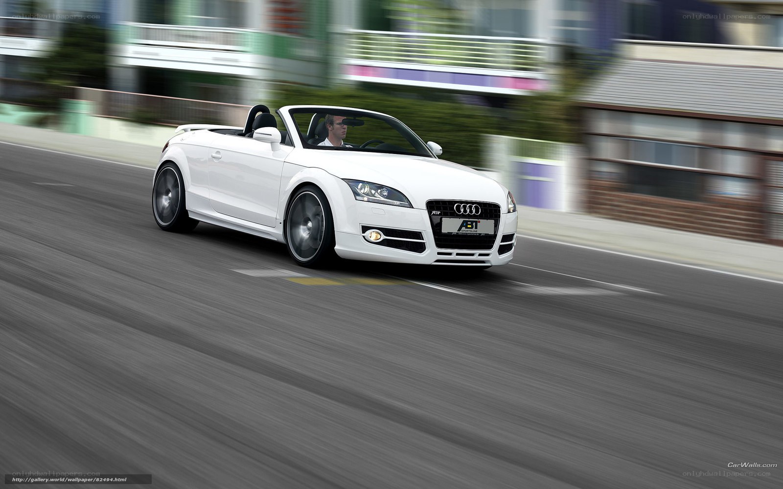 white audi tt roadster in motion