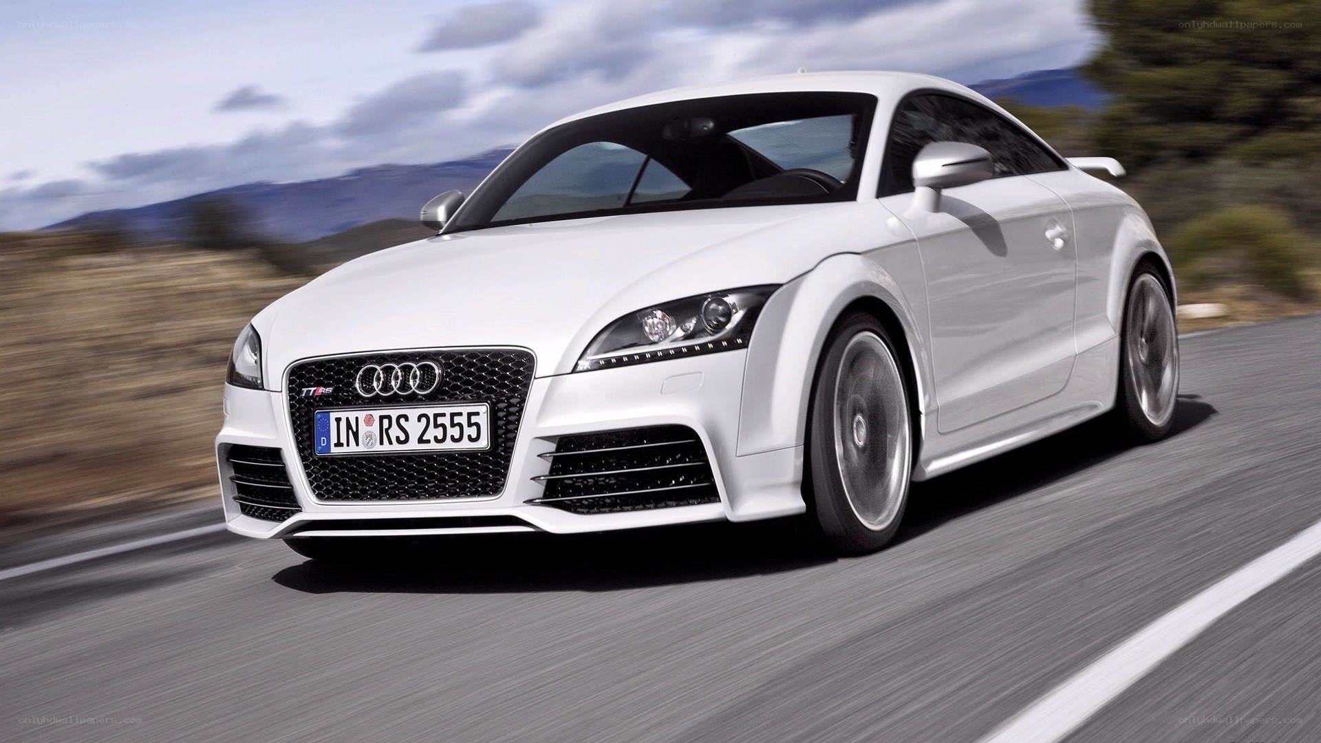 White Audi TT RS in motion