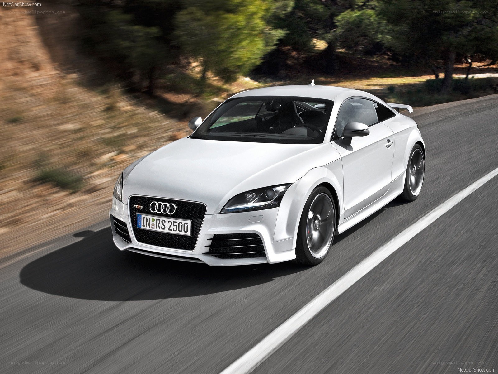 White Audi TT RS in motion