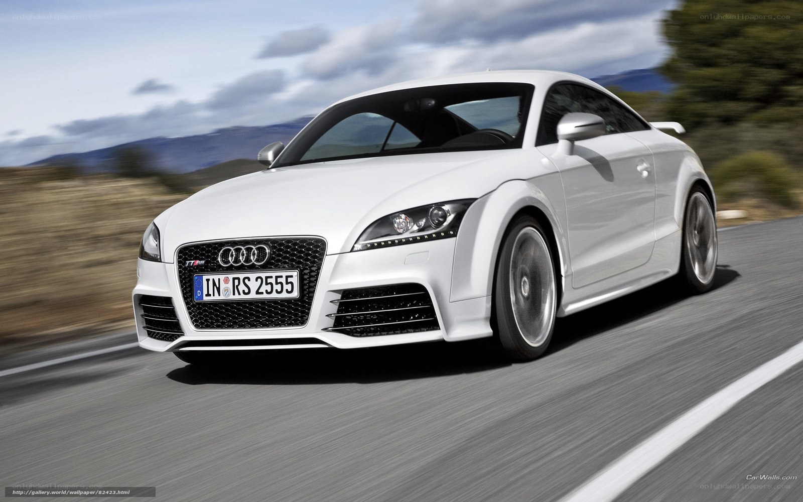 White Audi TT RS in motion