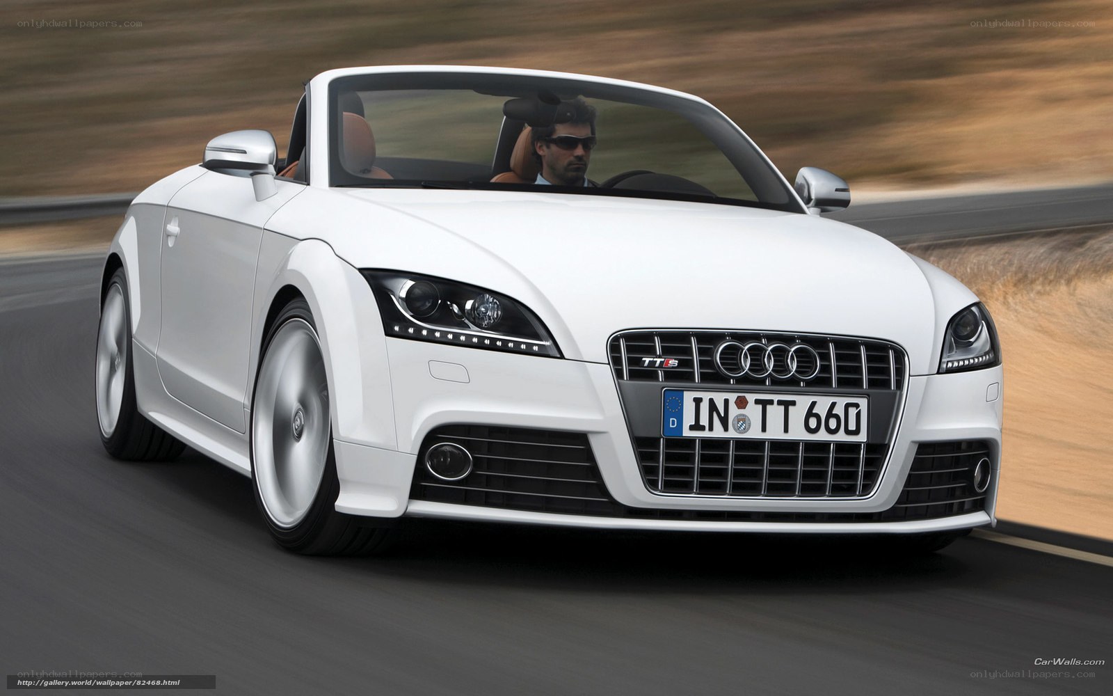 White Audi TT S convertible in motion