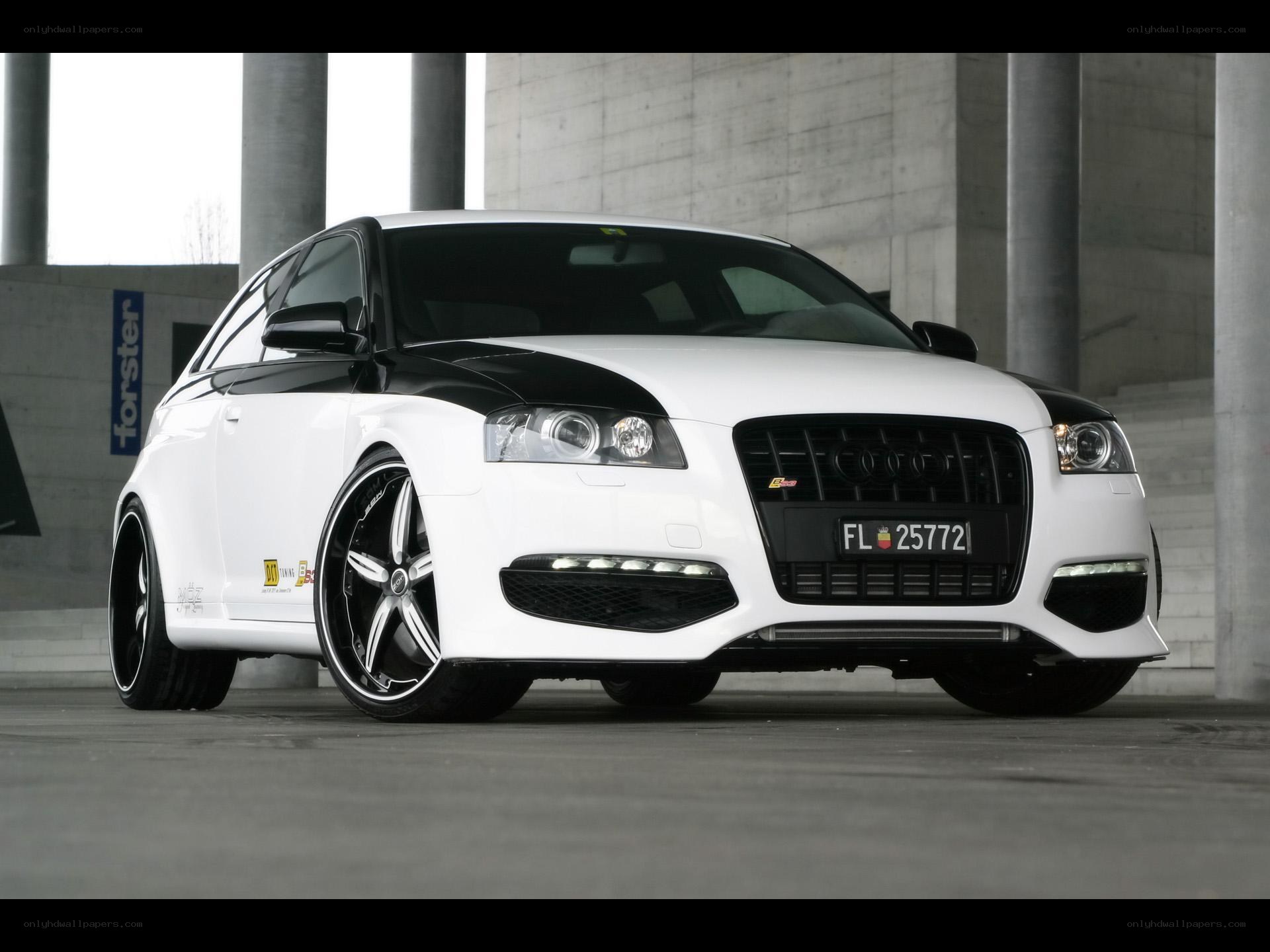 white audi with black accents