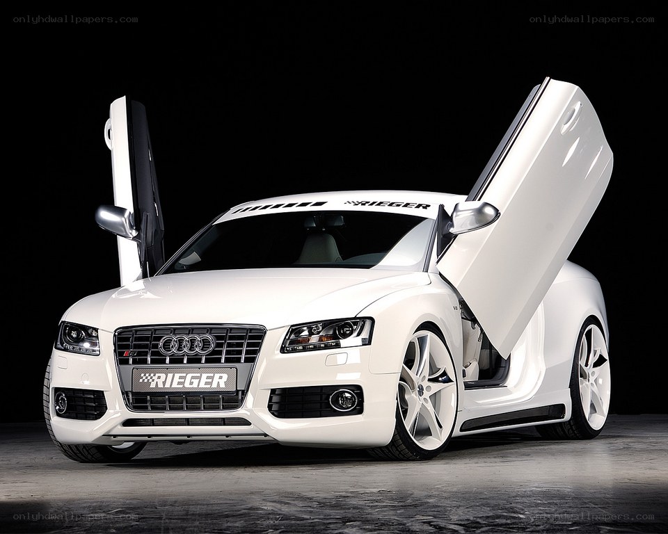 White Audi with gullwing doors