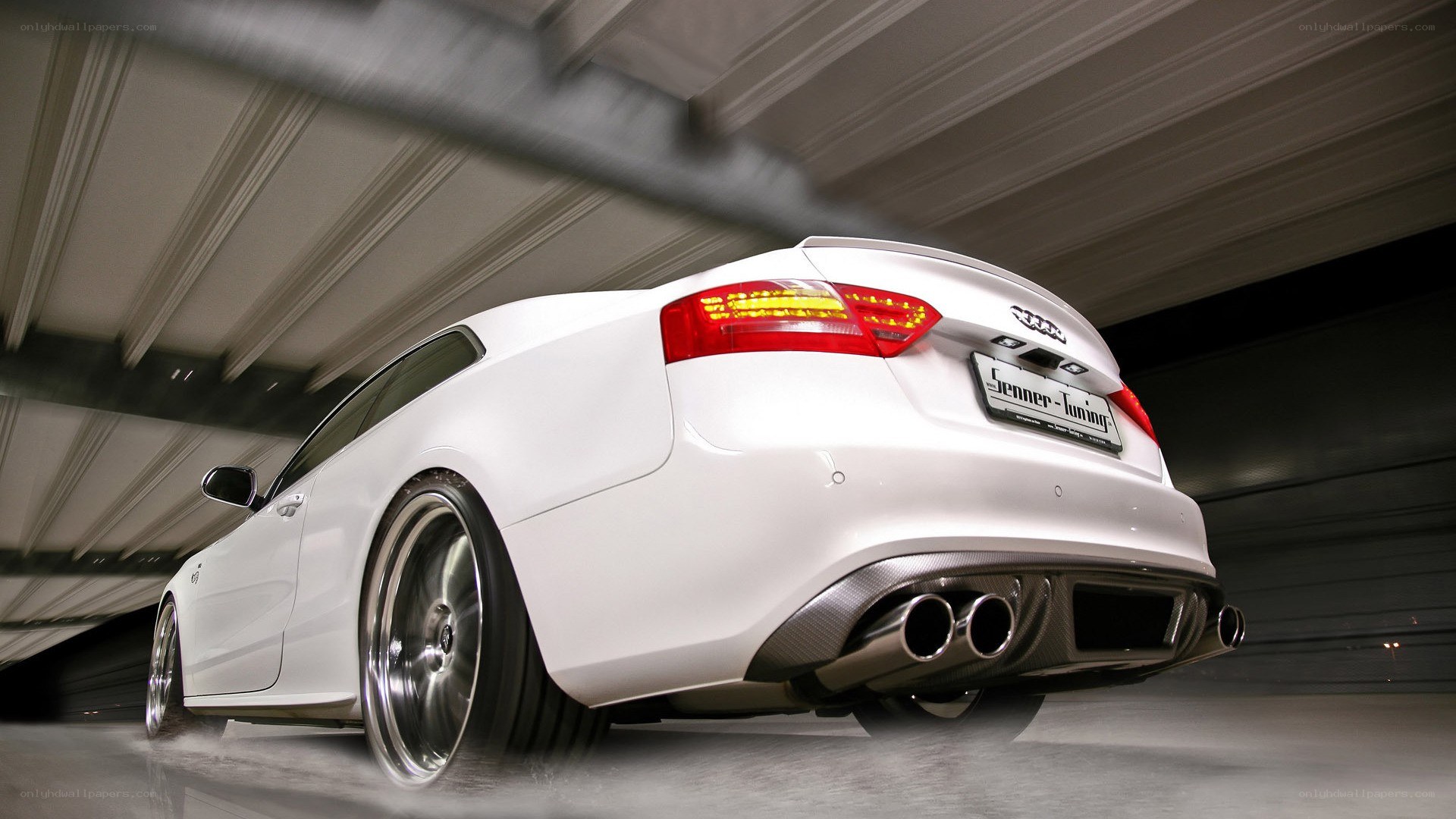 white audi with performance exhaust
