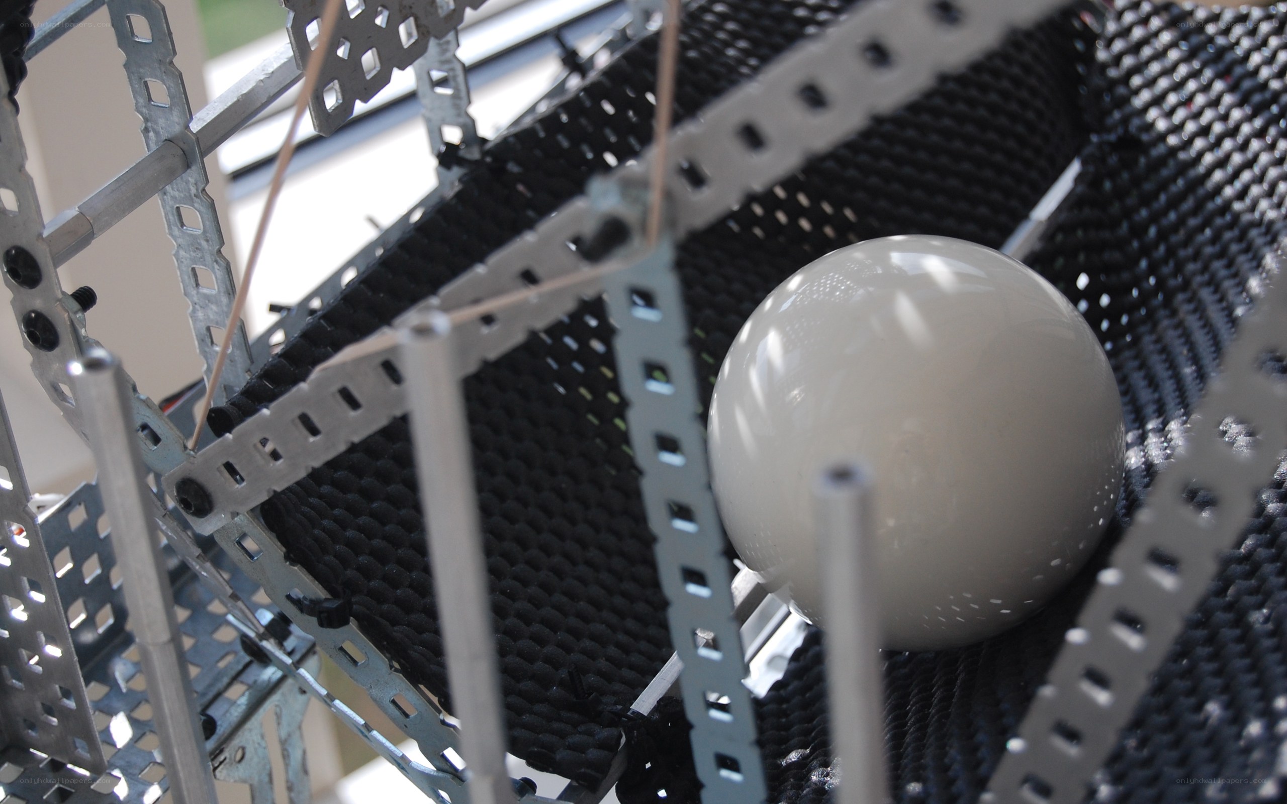 white ball in metal structure