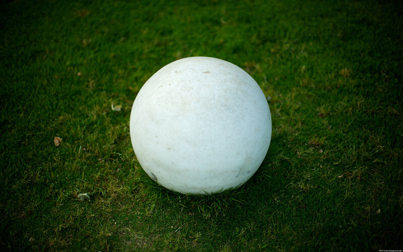 white ball on grass