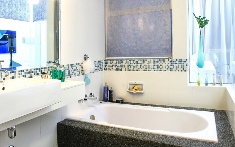 White Bathtub in Bathroom — Clean