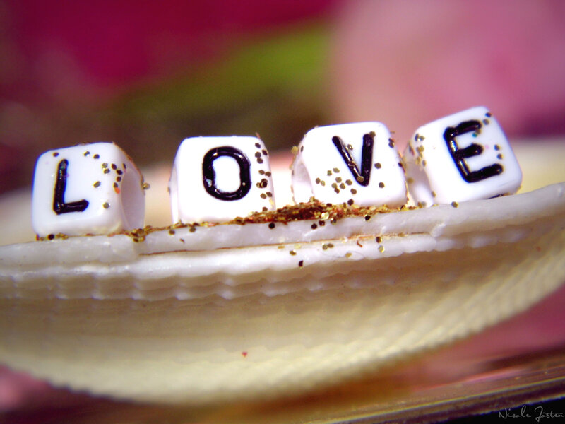 White Beads Spelling Love