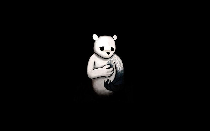 white bear with dark tattoo
