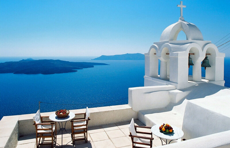 White Bell Tower Overlooking Sea