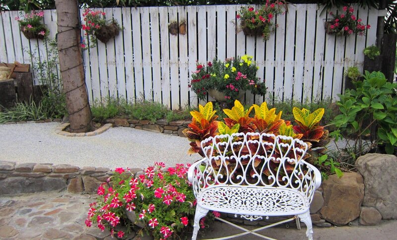 White Bench in Garden — Serene