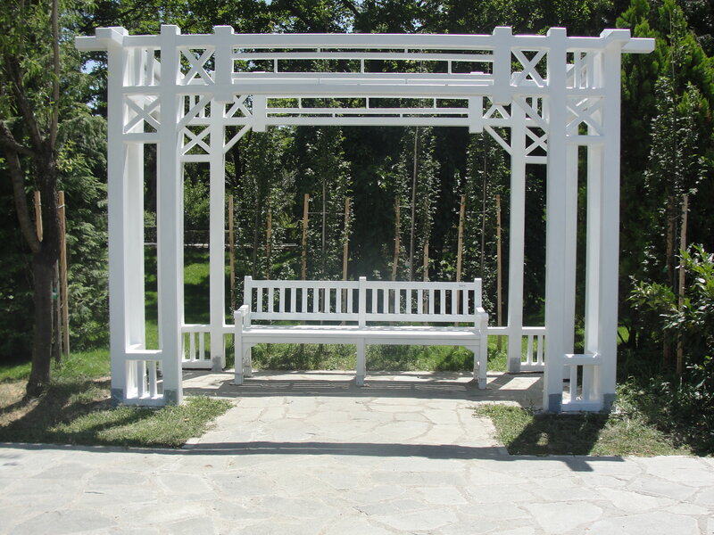 White Bench under Pergola