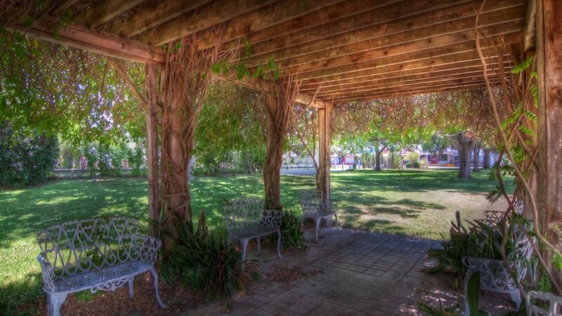 White Benches under Pergola