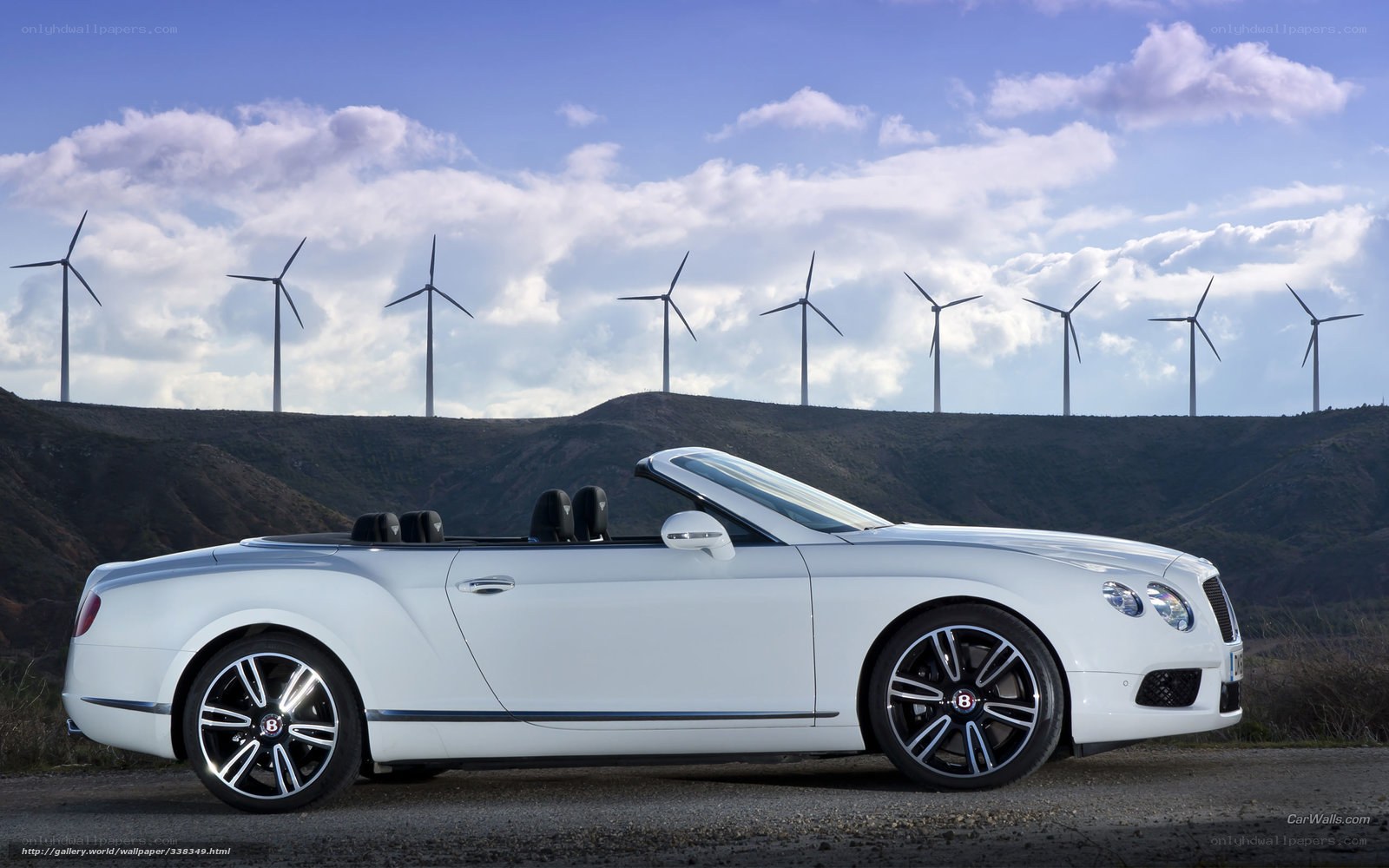 White Bentley convertible on hillside