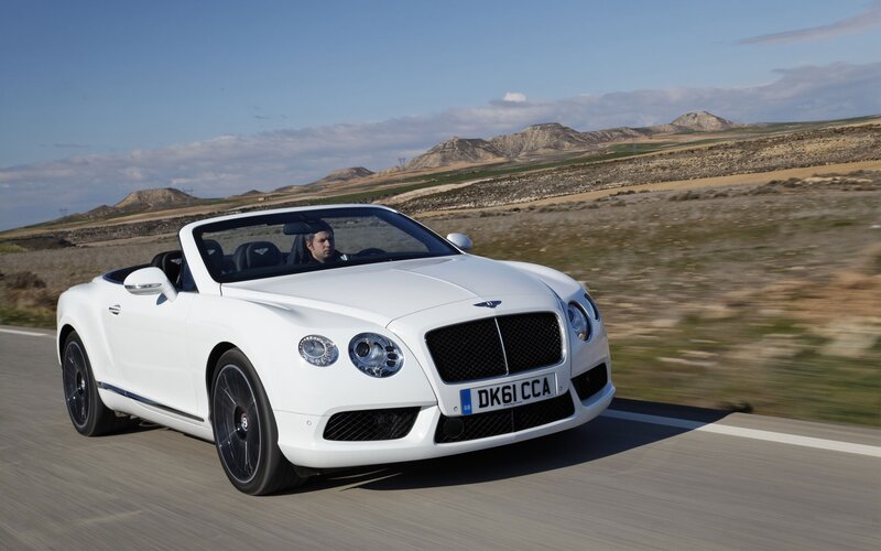 White Bentley convertible on road