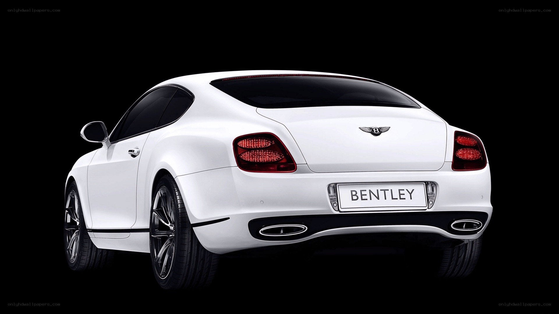 white bentley coupe rear view