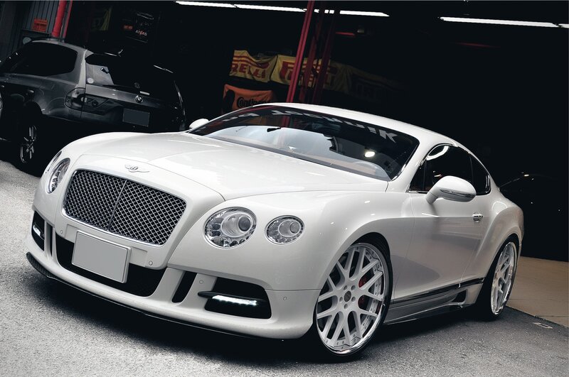 White Bentley in a garage