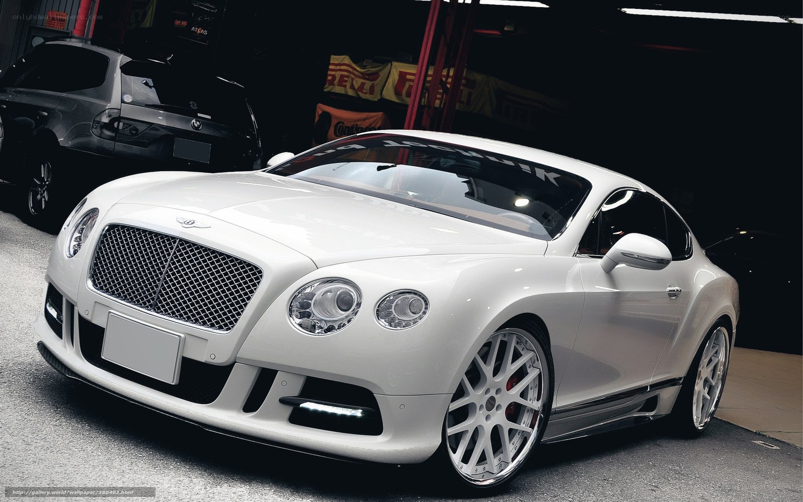 White Bentley in a garage