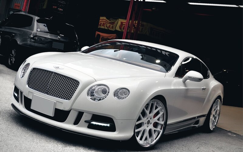 White Bentley in garage