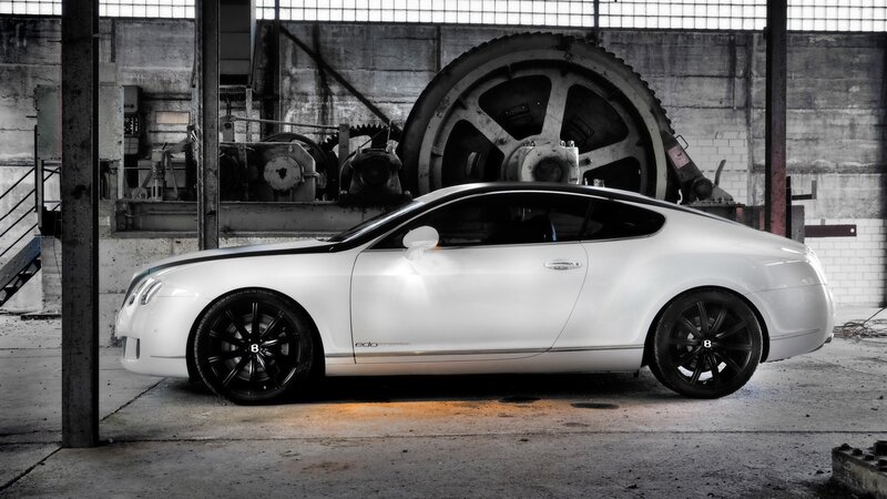White Bentley in industrial setting