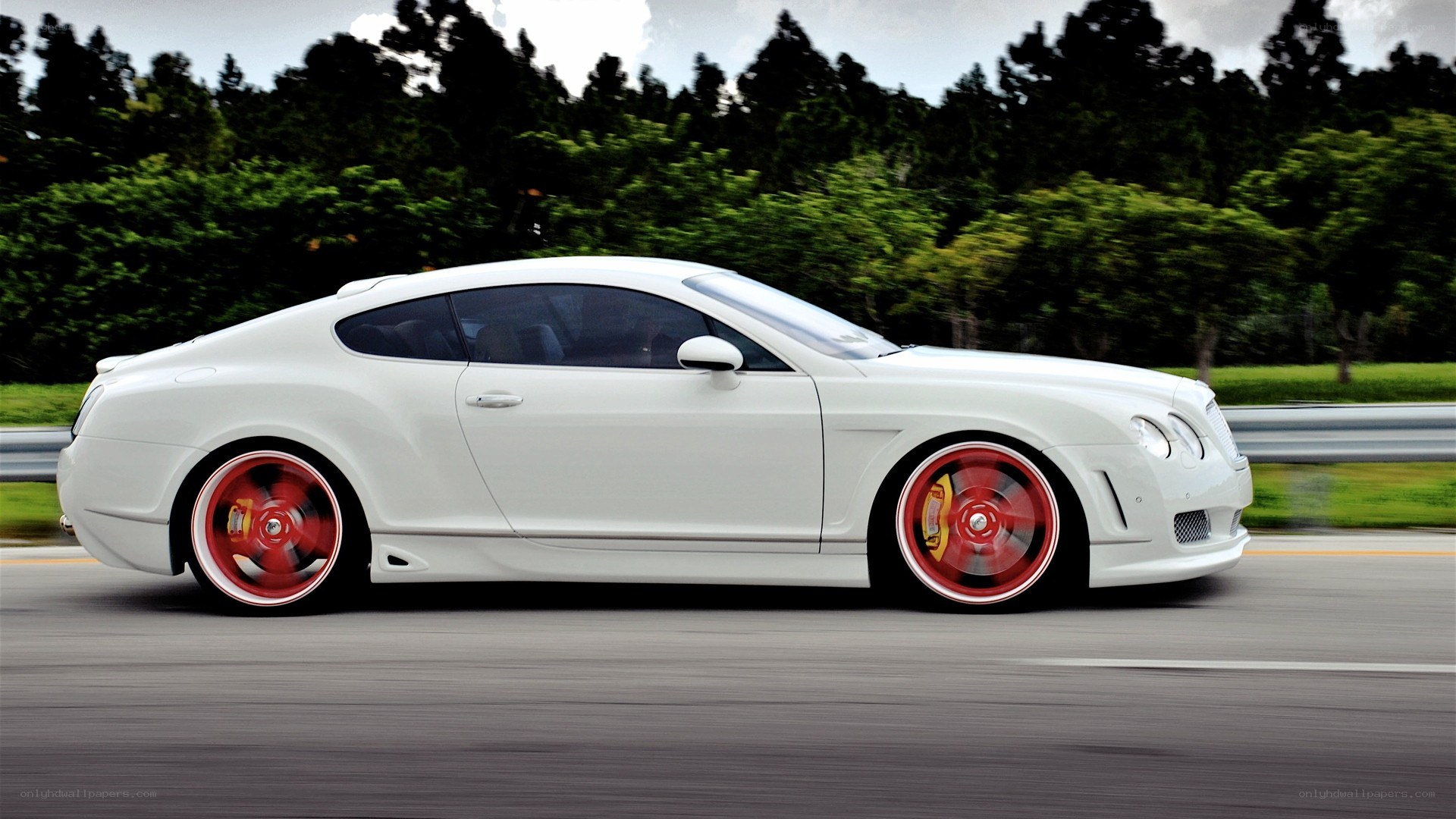 white bentley in motion