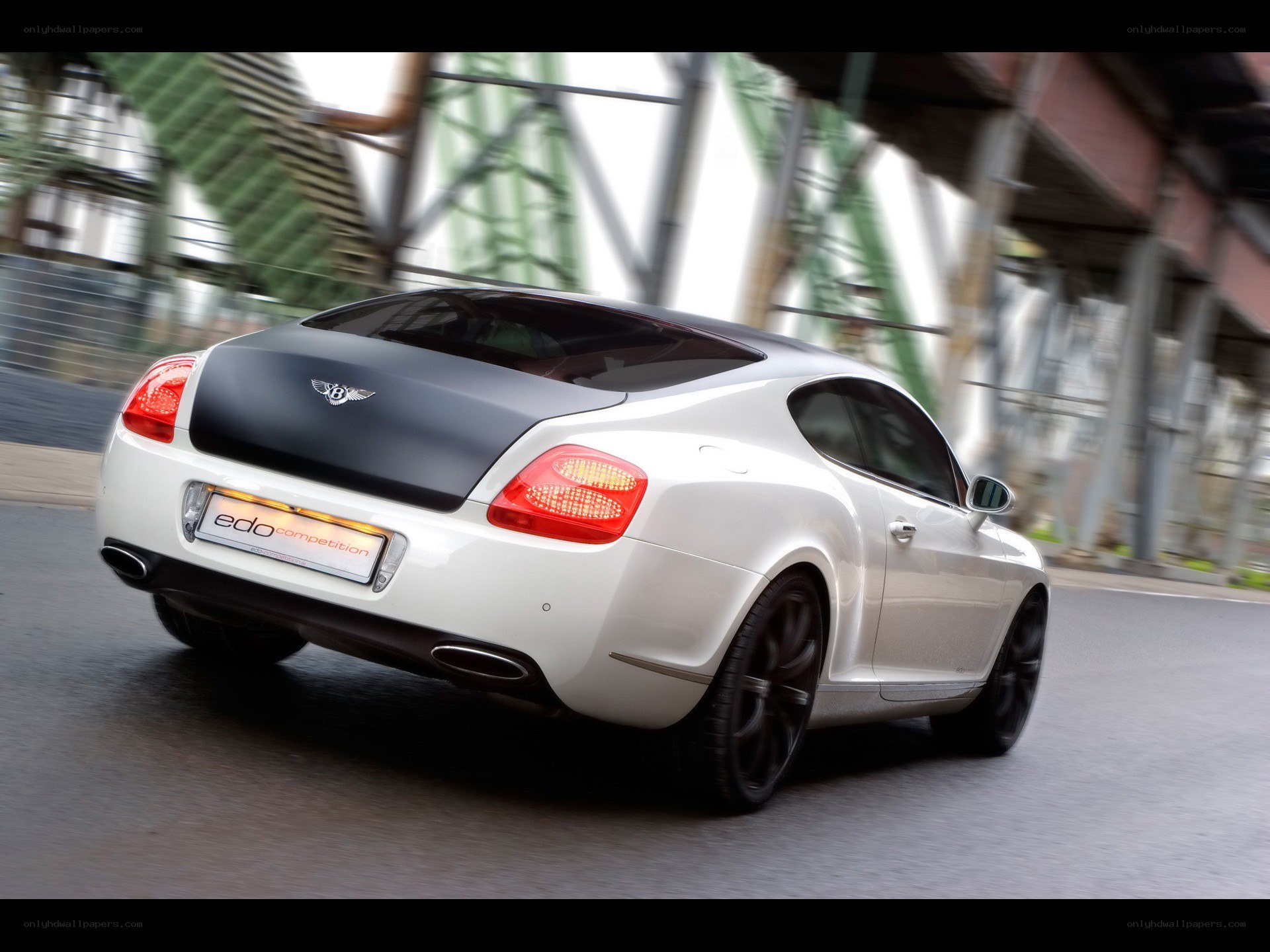 White Bentley in motion