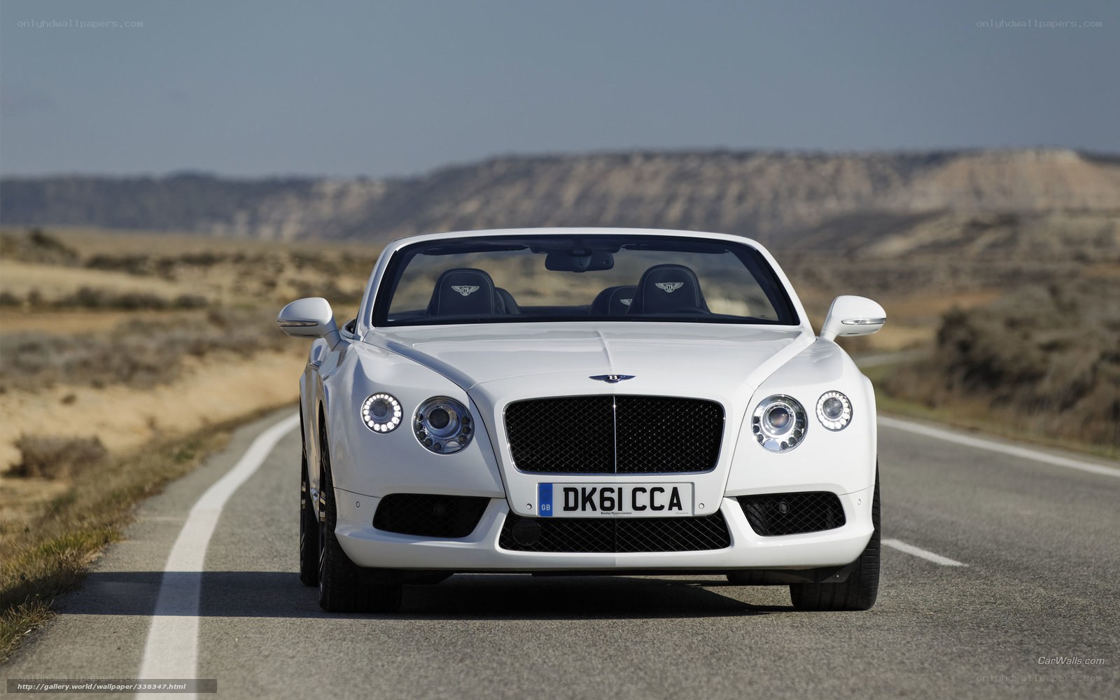 White Bentley on a desert road