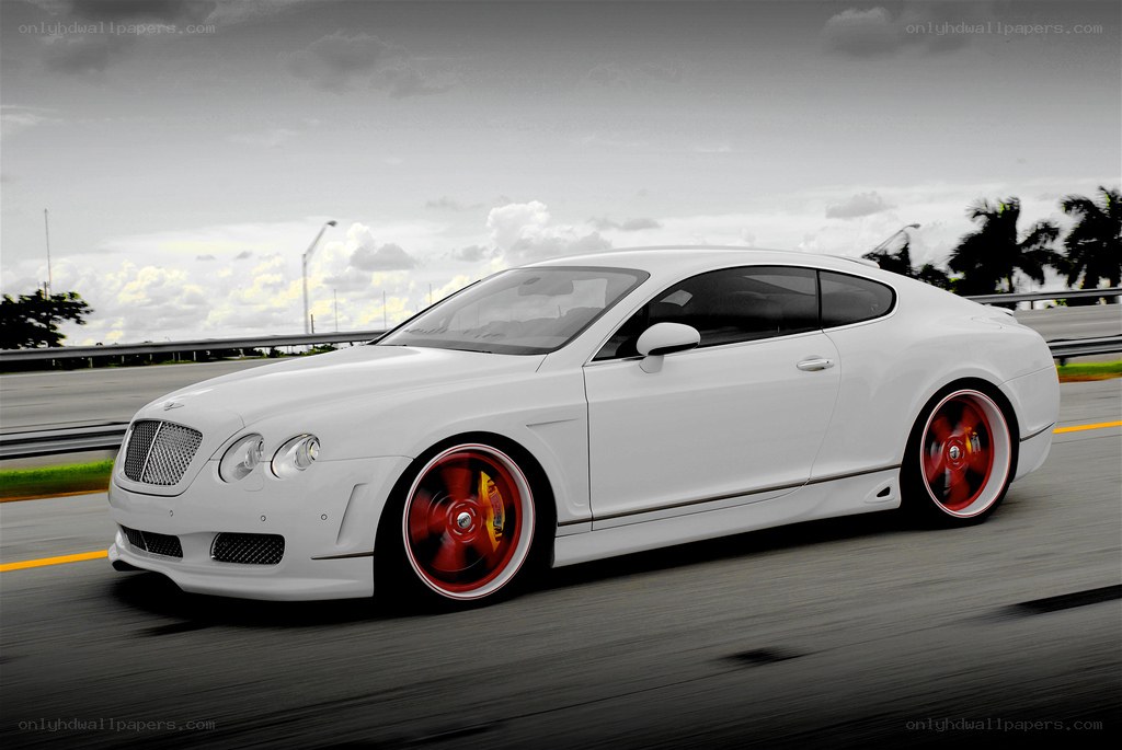 white bentley on a highway