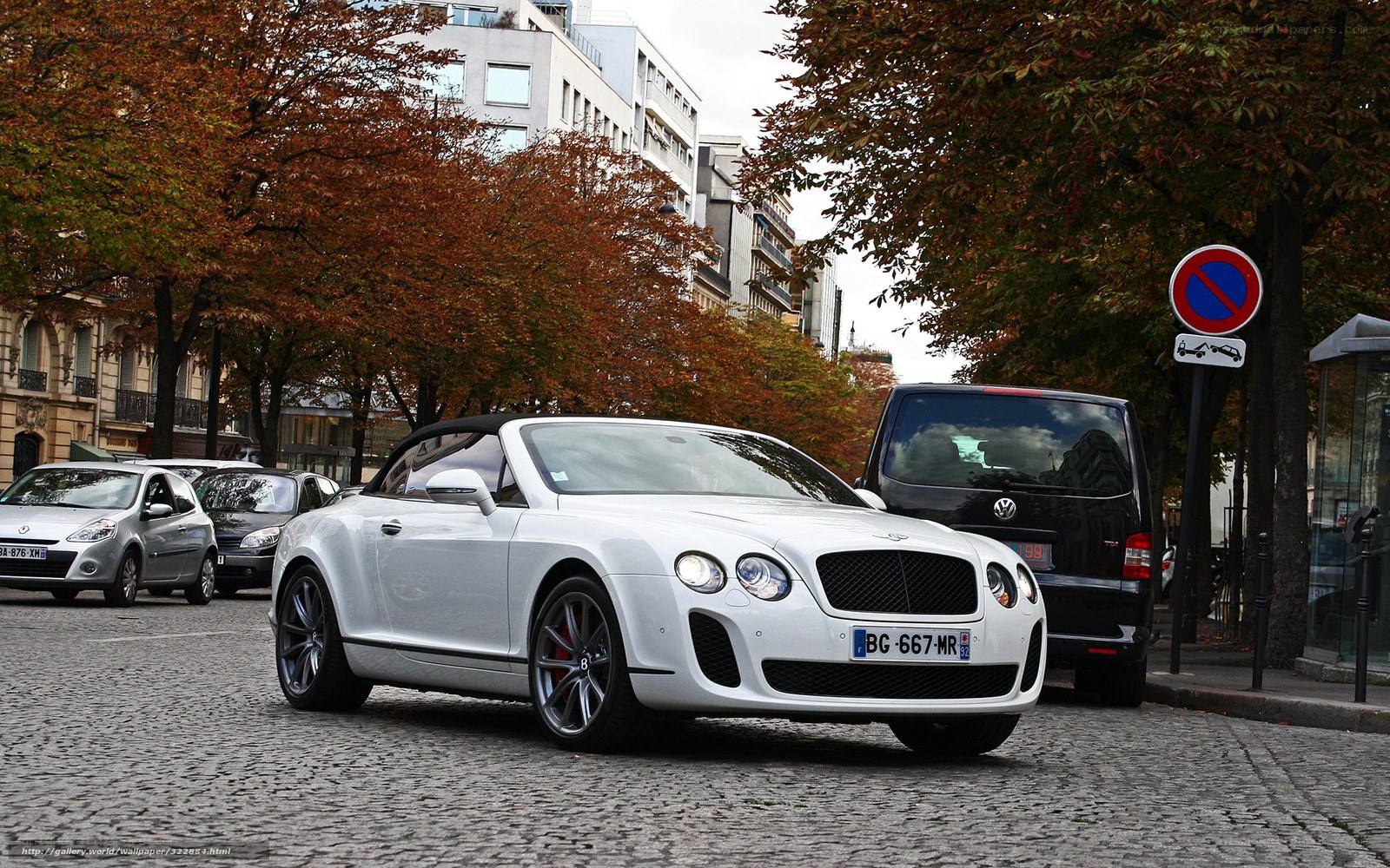 White Bentley on cobblestone street